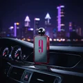 Perfume 9 PM Rebel at car dashboard with city neon lights Malaysia night