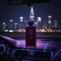 Perfume Afnan 9 PM Rebel at car dashboard night with city neon lights Malaysia masculine style