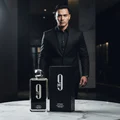 Malay man in black suit with Afnan 9pm perfume luxury men fragrance Malaysia