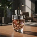 Afnan Rare Carbon men perfume Malaysia – Perfume bottle with botanical design on a wooden table in a blurred indoor setting