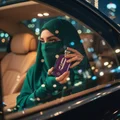 Hijab-wearing woman inside car holding perfume with malaysia city night lights romantic cinematic