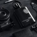 Lifestyle Malaysian man with Supremacy Noir Afnan perfume dark woody amber suitable for dinner night