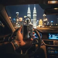 Driver Malaysia holding Supremacy Silver with KL lights night