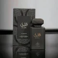 Black perfume bottle and packaging with 'Al Layl' branding on a reflective surface.