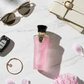 Tibyan by Al Wataniah 100 ml flat lay with car keys and women accessories
