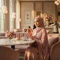 Hijabi woman holding Tibyan by Al Wataniah 100 ml at Pavilion KL