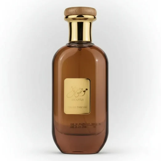 Brown perfume bottle with gold cap on a white background