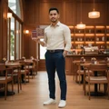 Malay man at cafe interior wooden with Oudi – vibe classy