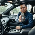 malay man in car with jazzab silver - malaysia