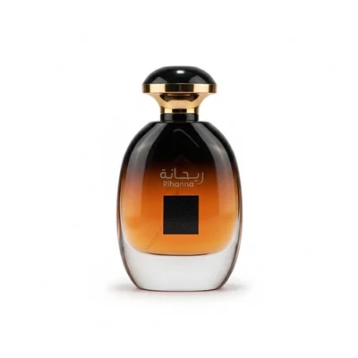 Perfume bottle with 'Rihanna' branding on a pink background