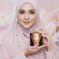 Malaysian hijab-wearing woman holding Romancea – vibe romantic soft