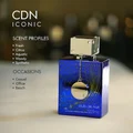 Perfume bottle with 'CDN Iconic' branding and product details on a blurred background