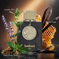 Perfume bottle labeled 'lionheart' with natural elements like lavender, mint, vanilla, and honeycomb on a dark background