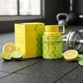 Armaf Odyssey Limoni Fresh next to dumbbells at gym