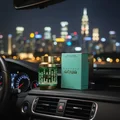 Armaf Odyssey Aqua Edition in car at night with city lights