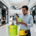 Man holding a bottle of Odyssey Limoni in a mall setting