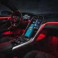 Vulcan Feu inside car with modern red lighting