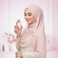 Malaysian hijab woman pegang perfectly pink feminine sweet