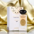 Perfume bottle and packaging of Musk Collection Tahara Vanilla on a gold fabric background