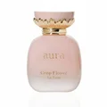 Pink perfume bottle with gold cap labeled 'aura Crisp Flower La Fede' on a white background