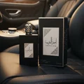 Ameer Al Arab men perfume in luxury black leather car interior gold light