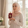 n hijab woman holding Ameerat Al Arab light pagi soft women's