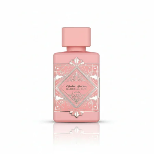 Pink perfume bottle with geometric design on a white background