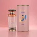 Perfume bottle and packaging with 'MAYAR' branding on a pink background