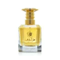 Perfume bottle with gold cap and clear glass body on a white background wangi world lattafa perfumes