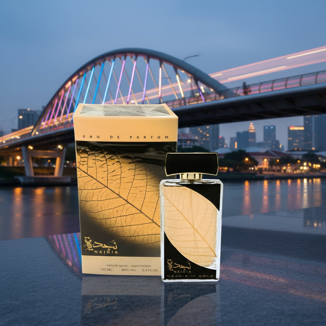 Najdia in Gold by Lattafa: Unveiling a Woody Fresh Amber EDP for Women