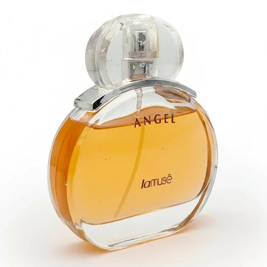 Perfume bottle and box labeled 'Angel' by la muse on a white background