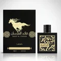 Box dan bottle Qaed Al Fursan Lattafa fragrance men's warm woody premium vibe