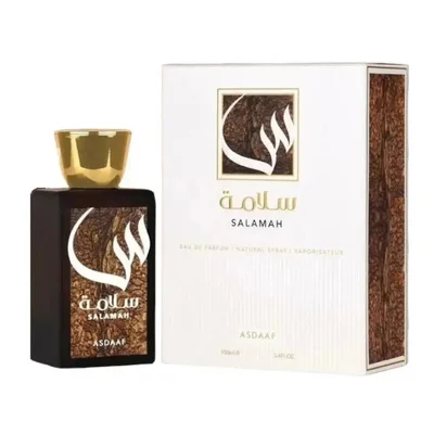 Perfume bottle and packaging of Golden Oud on a white background