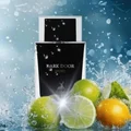 Perfume bottles labeled 'Dark Door Sport' with lemons and limes on a water splash background