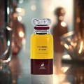 Yellow and red perfume bottle labeled 'Flaming Elixir' with floral background