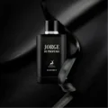 Black perfume bottle labeled 'Jorge di Profumo' on a gray background