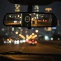 Kismet For Men reflection car rearview mirror at night KL