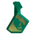 Green bottle with gold geometric patterns and 'Alhambra' branding on a white background