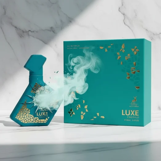 Perfume bottle broken, icy mint fog emerging; studio on white marble — clear bottle and box, cinematic lighting.