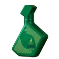 Green perfume bottle with geometric design on a white background