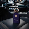 Philos Pura Maison Alhambra perfume bottle on leather car seat luxury men scent