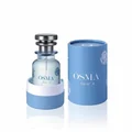 Blue Osma Floral'A perfume bottle with ginger, cinnamon, and flowers on a beige background
