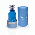 Blue Osma M perfume bottle with matching cylindrical container on a white background