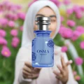 Blue Osma Vanilla S perfume bottle on a white background