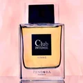 Perfume bottle labeled 'Club Intense' by Pendora Scents on a pink background