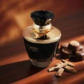 Carino Black by Rue Broca perfume bottle with chocolates and patchouli luxury women scent