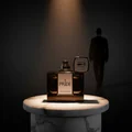 Rue Broca Pride Intense EDP bottle and box marble pedestal spotlight men fragrance