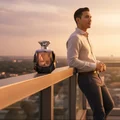 Rue Broca Touche Pour Homme perfume bottle on balcony golden hour KL skyline men scent Malaysia