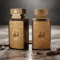 Al Embratur Elixir by Zimaya botol minyak wangi on wet marble with oud chips rain luxury scent Malaysia