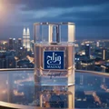 Mazaaj Infused by Zimaya perfume bottle on sky lounge table with KL night lights reflection